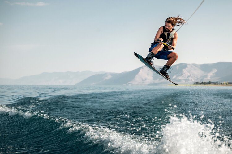 A person on water skis in the air.